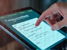 Person scheduling an appointment on a digital calendar interface.